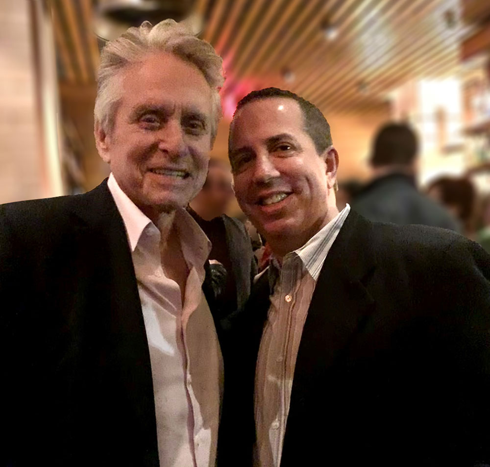 candid shot of Michael Douglas and Paul Scott Adamo