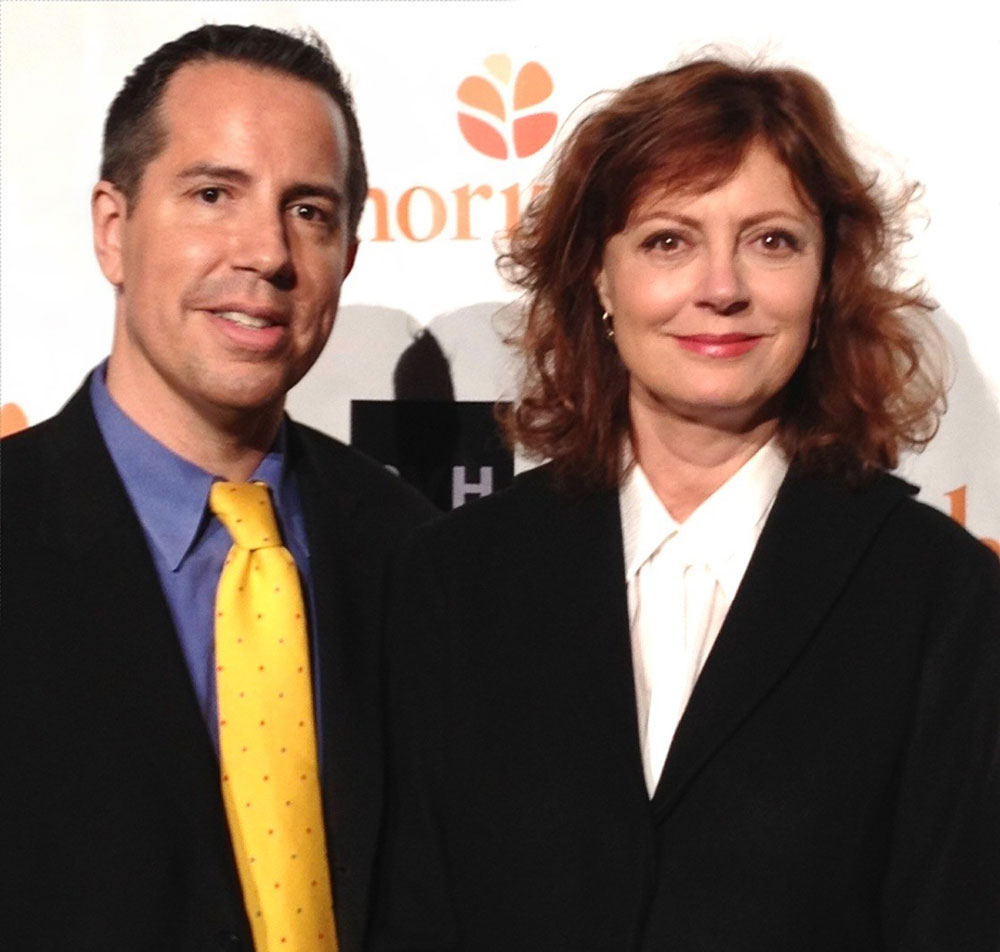 candid shot of Susan Sarandon with Paul Scott Adamo